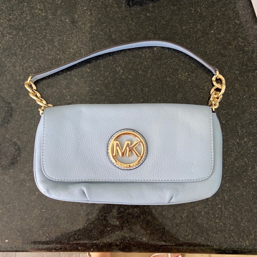 Real new condition Michael Kors, baby blue